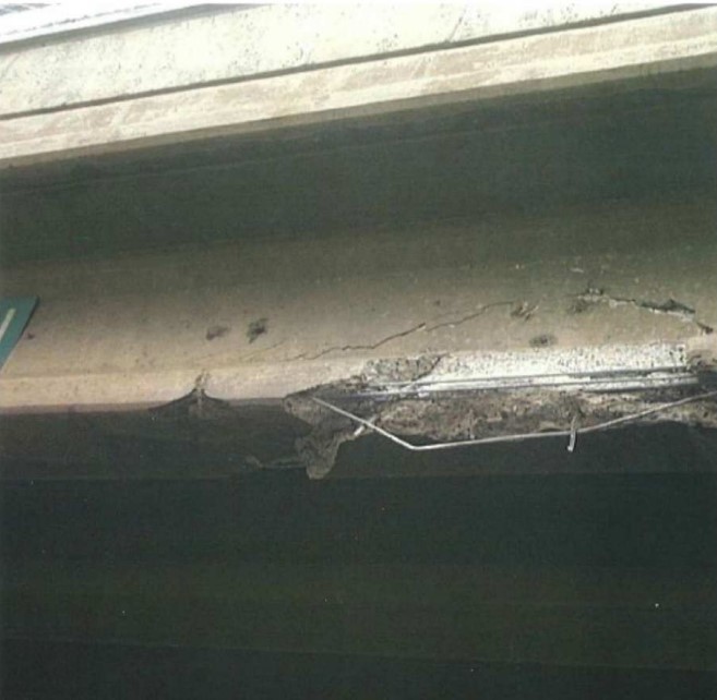 Damage to Jefferson Street underpass from one of the earlier collisions.