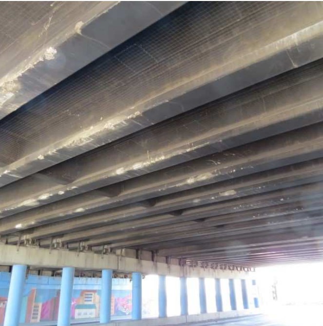 Fig. 3. Damage to 19th Ave. bridge girders from numerous collisions.